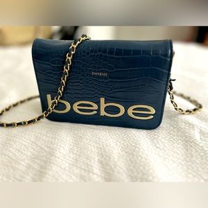 BEBE small animal print crossbody bag.